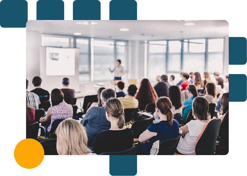 Private training image, person teaching in front of others in white room